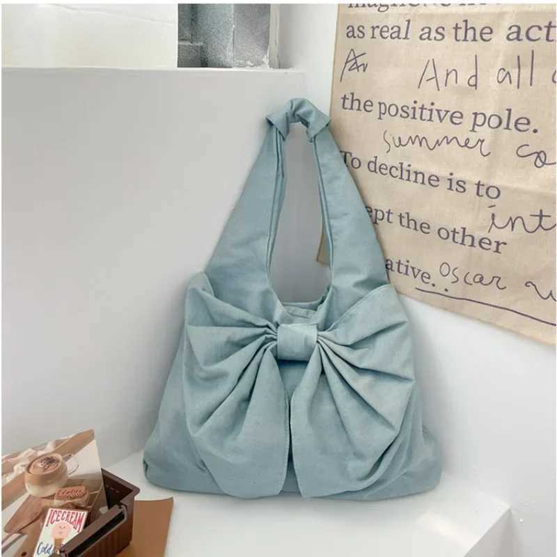 New Arrival Cowboy Buckle Quality Handbag Solid Color Bow High Fashion Womens Shoulder Bag Z250118
