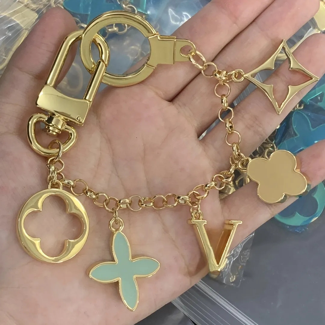 FLEUR DE MONOGRAM Chain Handmade designer keychains Fashion luxurys Key designers Buckle lovers Car Keychain Keychains Men Women Bag Pendant Accesso