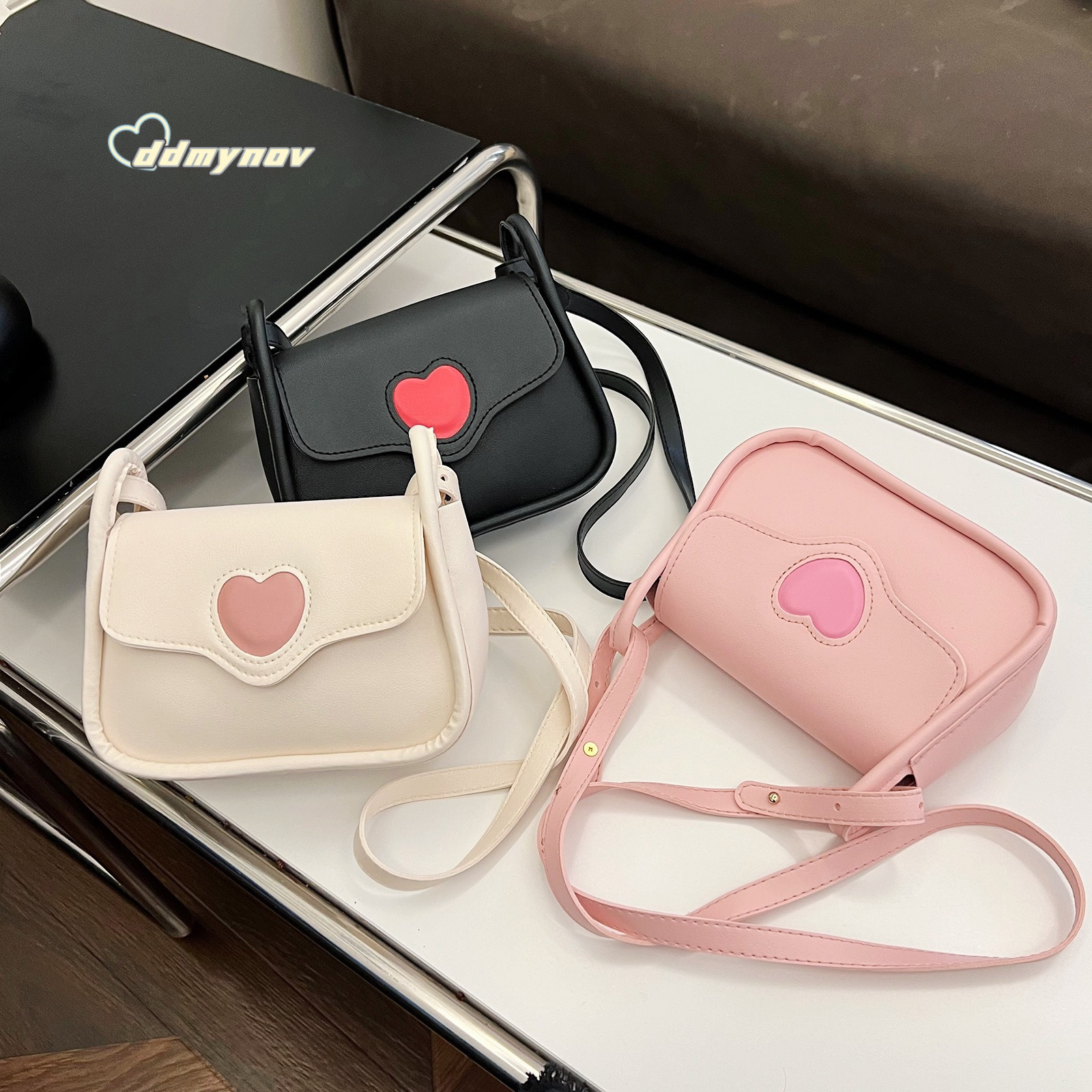 2024 printemps Nouveau niche de niche pour femmes polyvalentes à la mode haut de gamme haut de gamme Small carré sac ddmynov