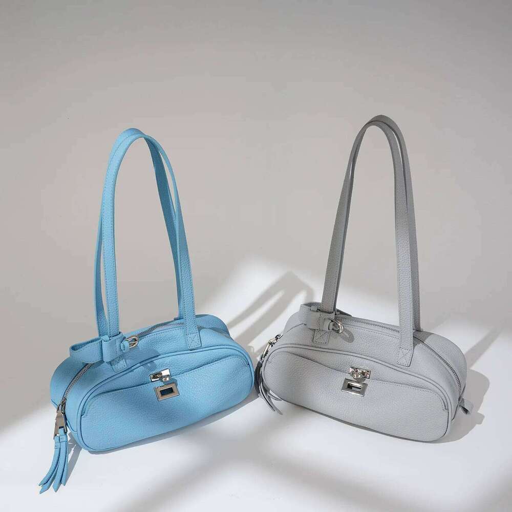Sacs 2025 Nouvelles femmes en cuir authentique en cuir avec des serrures de banlieue à chute de vache pour un sac d'aisselle à épaule unique