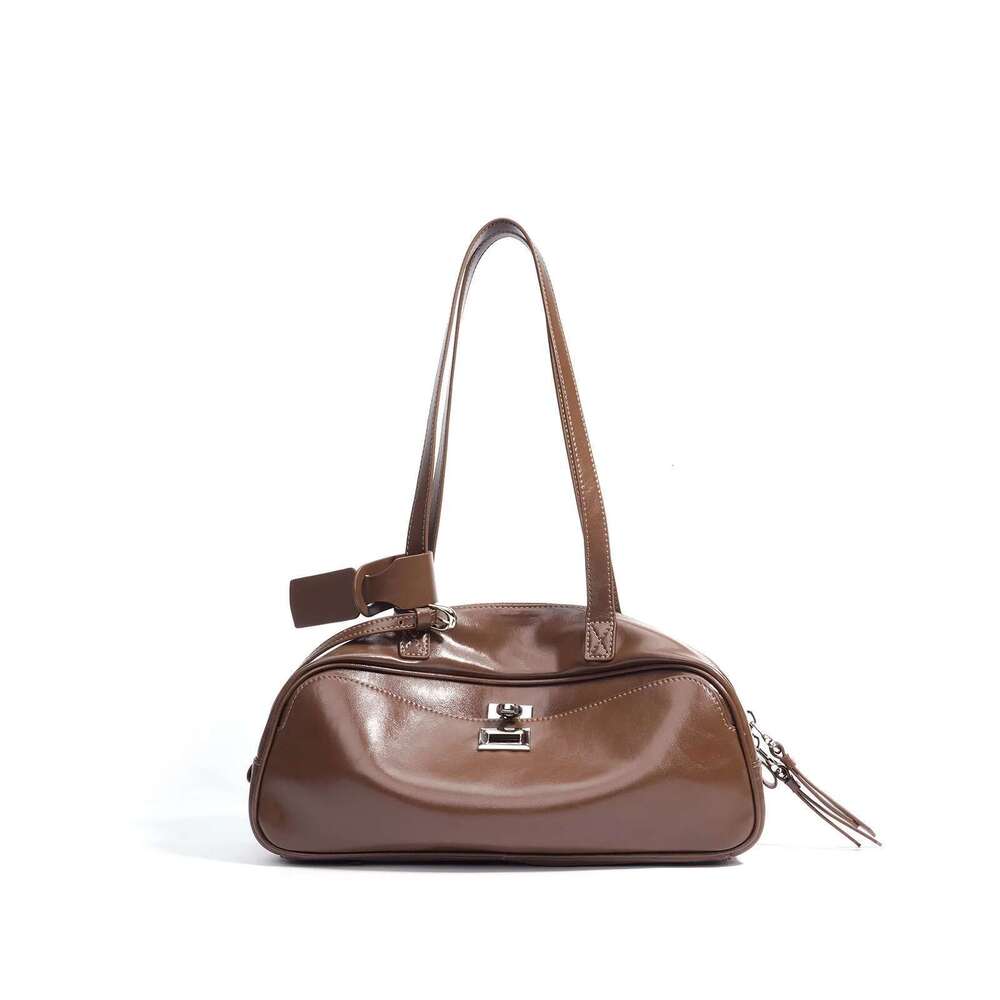 Cowhide underarm 2025 summer new niche design genuine leather handbag fashion commuter women's bowling shoulder bag