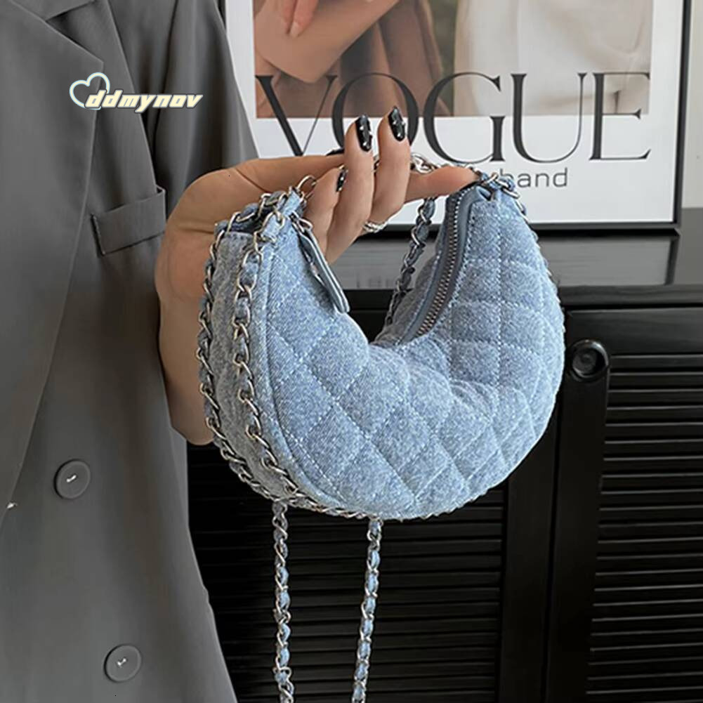 2023 Nouvelle chaîne de tissus denim Crossbody Fashion Fashion Diffusion Centant les petits sacs de croissant