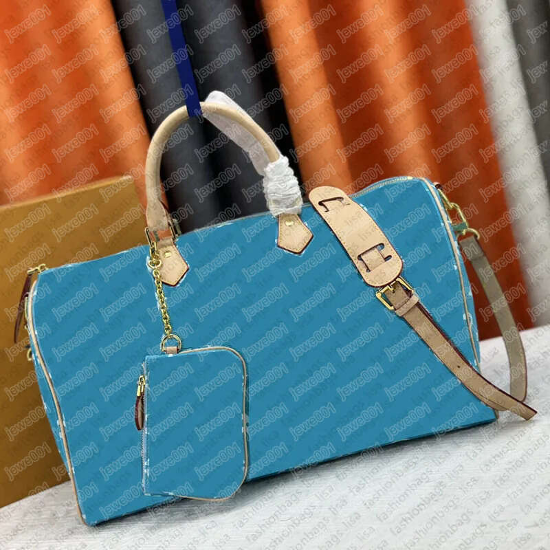 Designers fashion duffel bags luxury men female travel 2025 bag leather handbags large capacity holdall carry on luggage overnight weekender with-image-1061033440