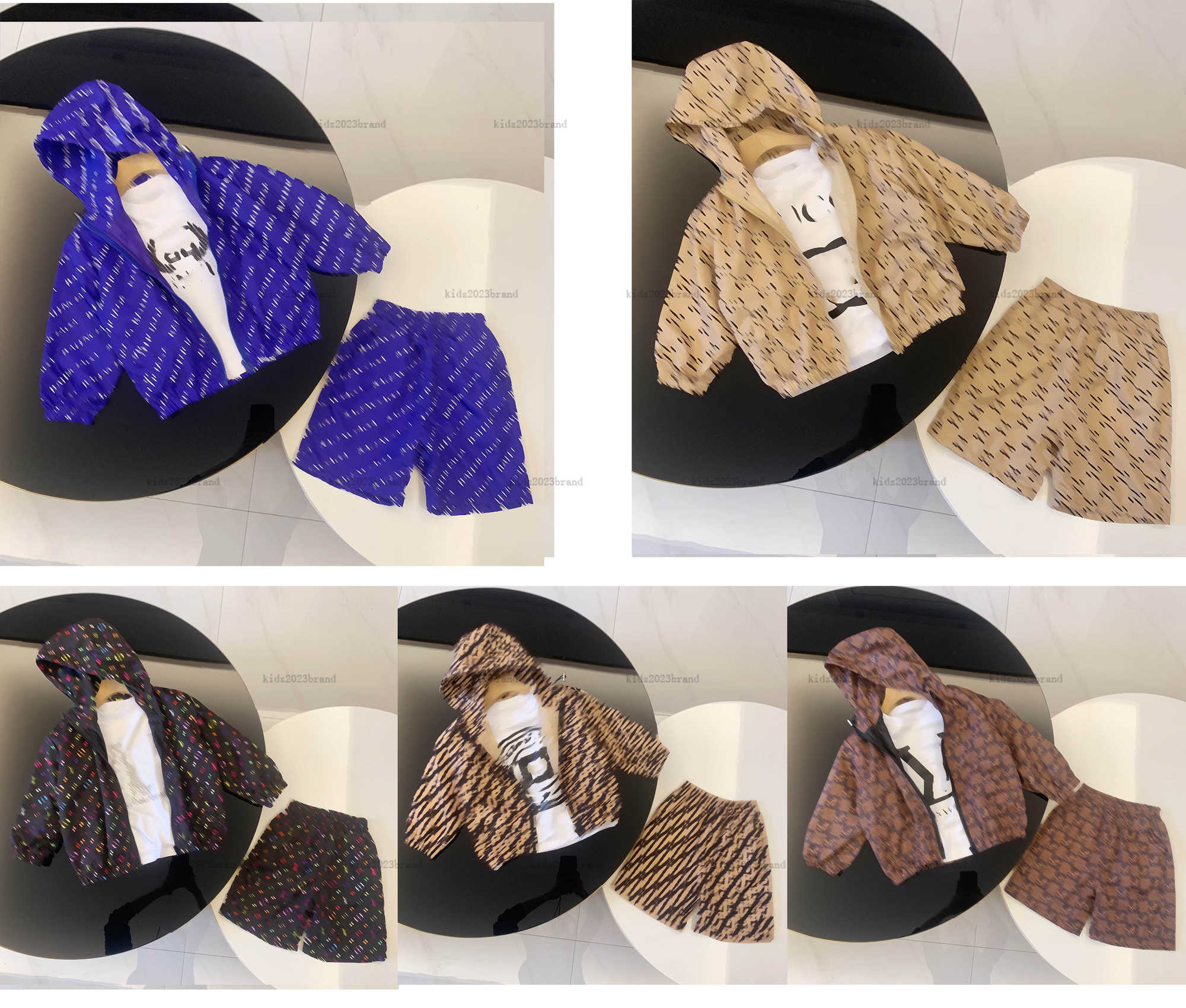 New Tracksuits Summer two-piece set High quality assault suit kids designer clothes Logo Full Print hooded jacket and shorts A000X05N249