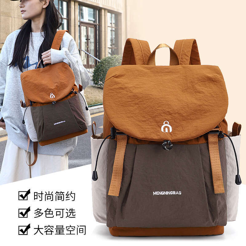 Nouveau style étudiant de grande capacité Backpack de voyage de voyage Backpack coréen Version simple décontractée à la mode élégante Double d'ép