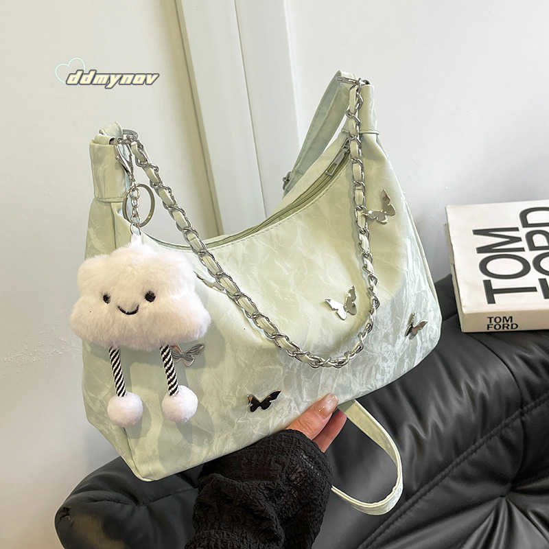 Sacs à la mode pour femmes 2024 AUTOMNE NOUVEAU PAPILFLY DÉCORS CROSSBOCK BOBODER HEONRAL MAIN SAGLE SMALT SAGLE SAC DDMYNOV
