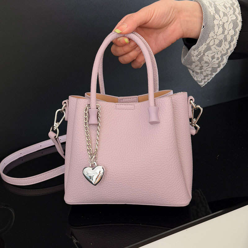Sac à main seau simple à mode haut de gamme pour femmes New Korean Style Ins Wind Crossbody Sac de banlieue polyvalent