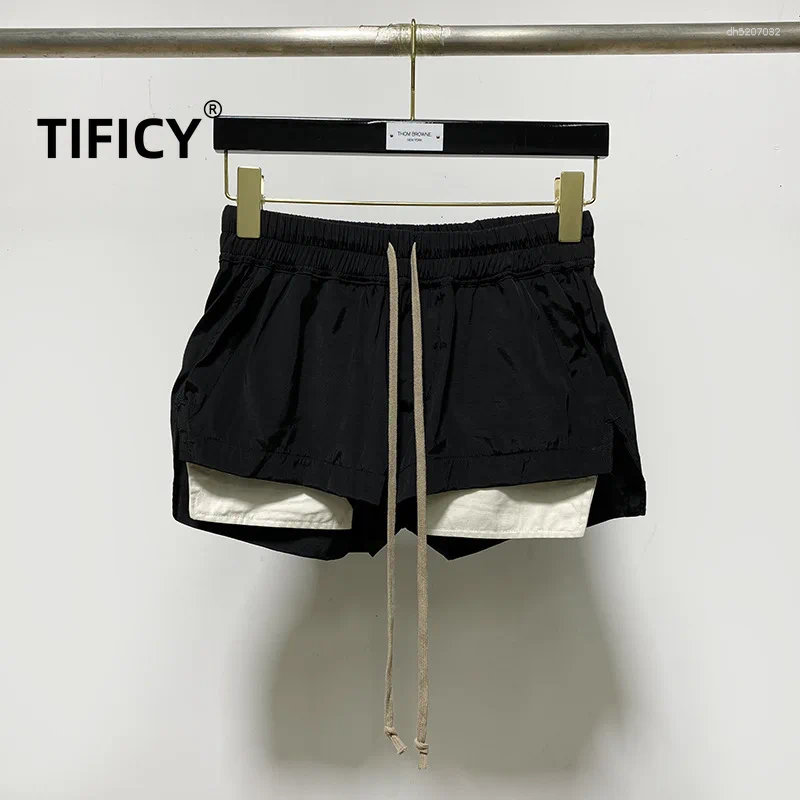 Shorts pour hommes Femmes Élégant haut taille noire artistique Style Feignant la jambe large avec un pantalon court à l'âge réduit