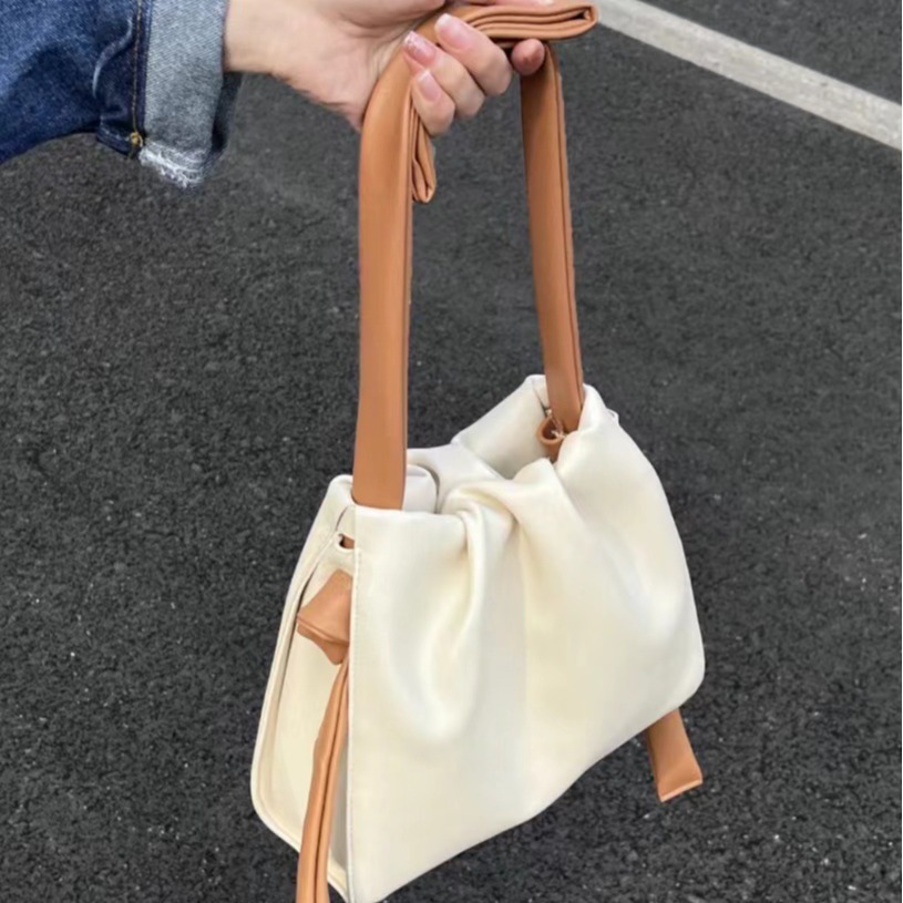 Sacs à bandoulière pour femmes, sac seau froncé à blocage de couleur, nouvelle Niche, début du printemps, 2025