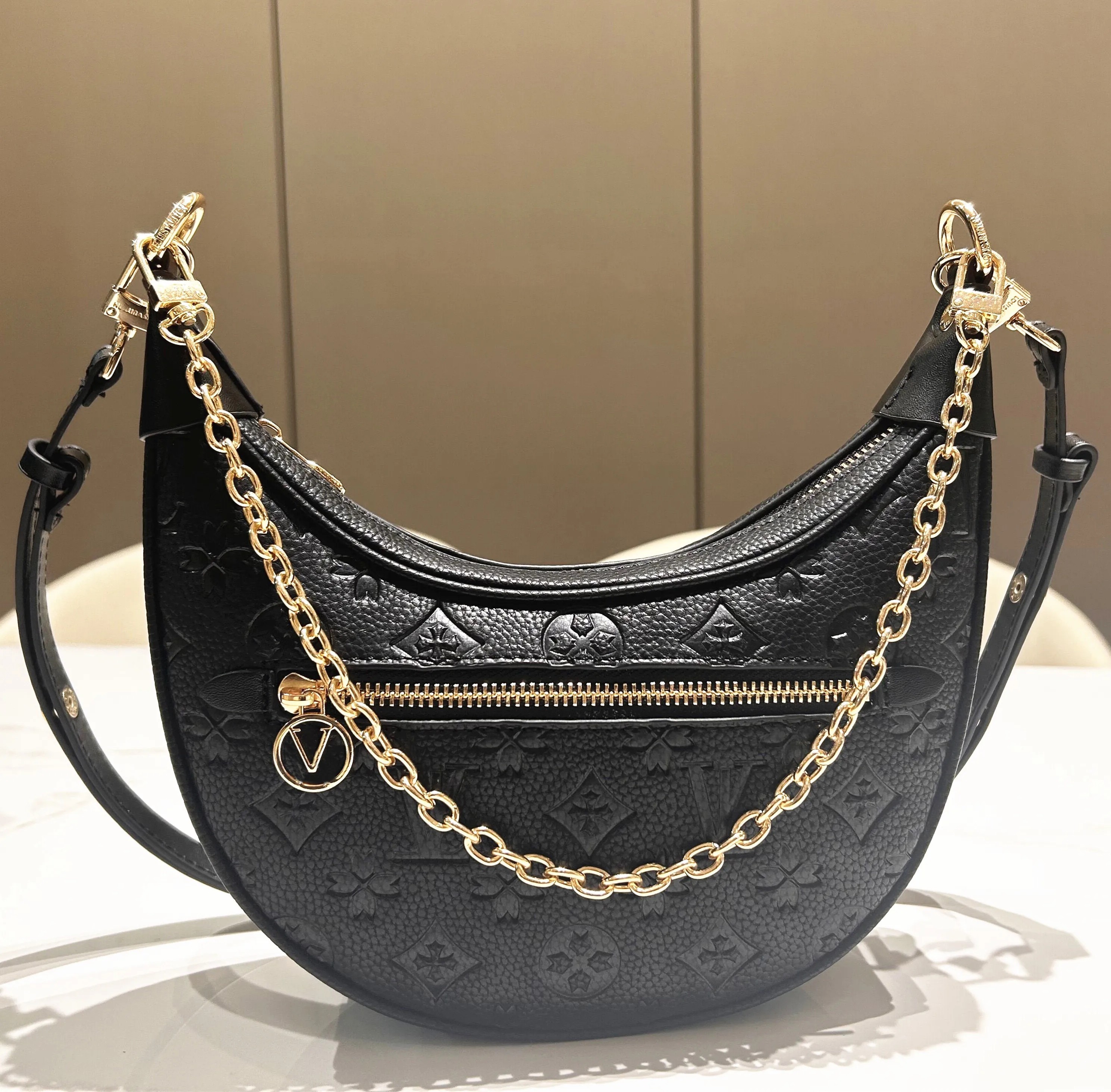 5A 2025 Loop Croissant bag shoulder hobo designer Purse M81098 Cosmetic half-moon baguette underarm Handbag crossbody Metal Chain Collection Women s