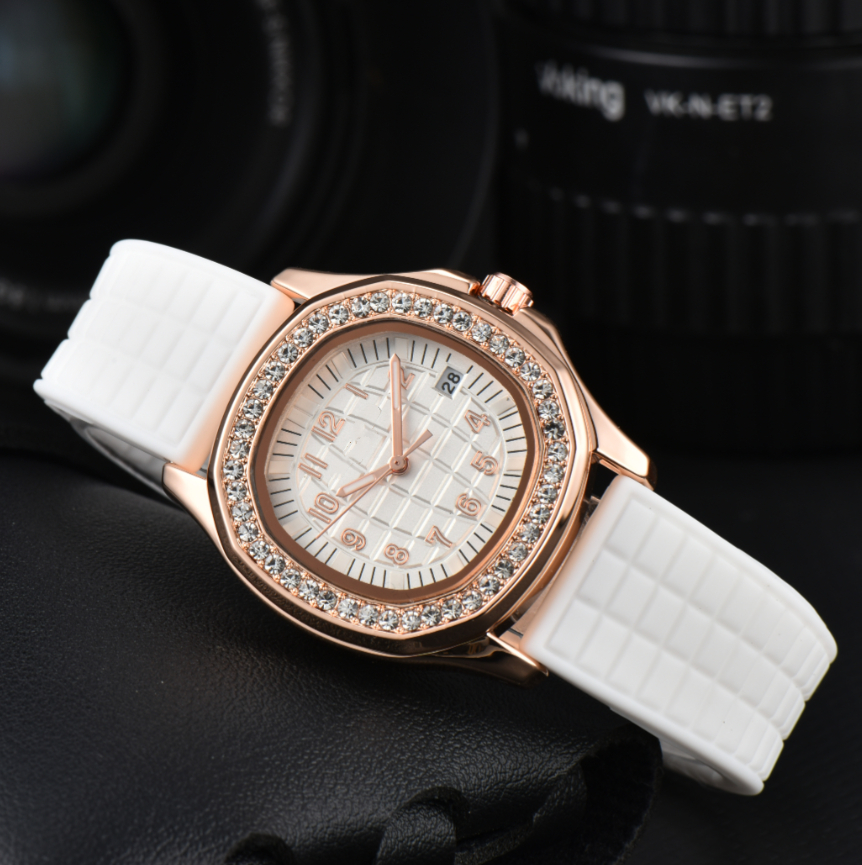 2025 NOUVEAU HOMMES PPITY PPITY AQUANAUTITY Série de bracelets Quartz Diamond Wristwatch Femmes Luxury High Quality Watch Dial Rubber Strap Wrist