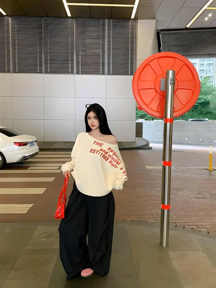 Autumn and winter womens high-grade sense of temperament 100 letters round neck hoodie loose two wear off-shoulder clothes 250614