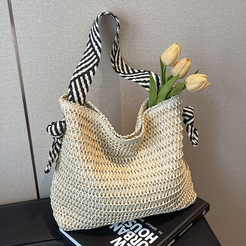 Free shipping designer Bag 2025 New Early Spring Casual Vacation Style Straw Tote Bag Fashion Versatile Large Capacity Shoulder Bag Beach Bag Women