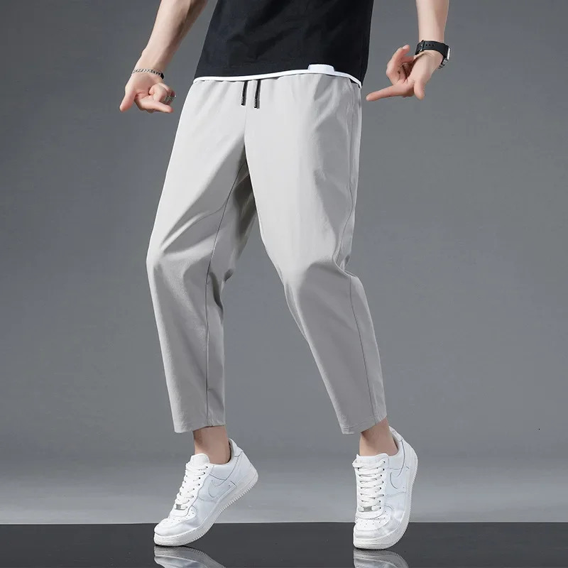 125KG Big Size Summer Ice Silk Crop Pants Mens Elastic Casual Edition Trendy Loose and Quick Drying Sports Large Crop Pants 250619