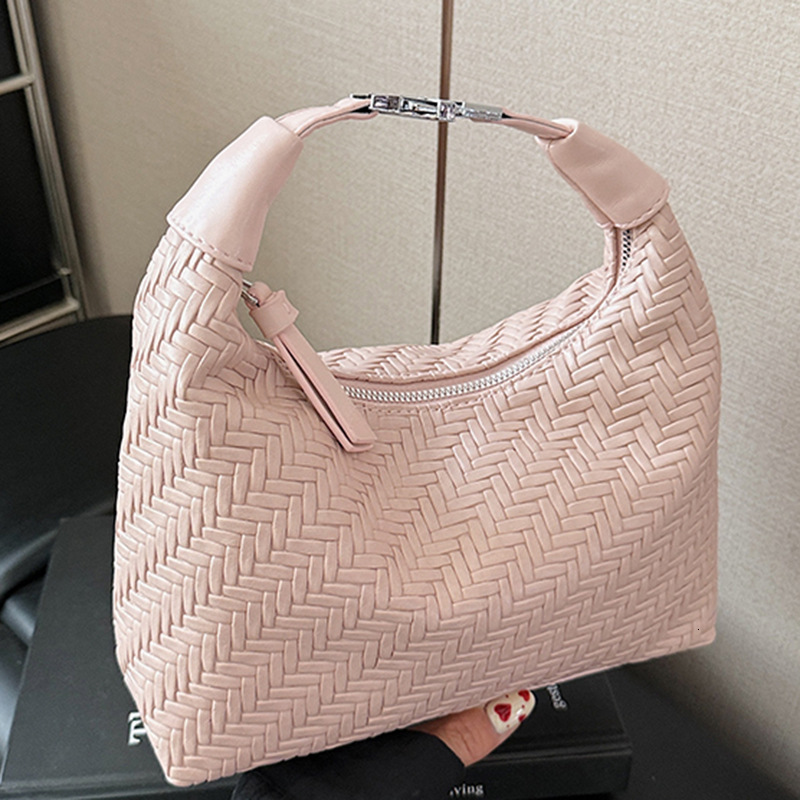 Free shipping designer Bag French Niche Woven Pattern Handbag Women Bag 2025 Spring Summer Simple Elegant Dumpling Bag Commuter Texture Crossbody Ba