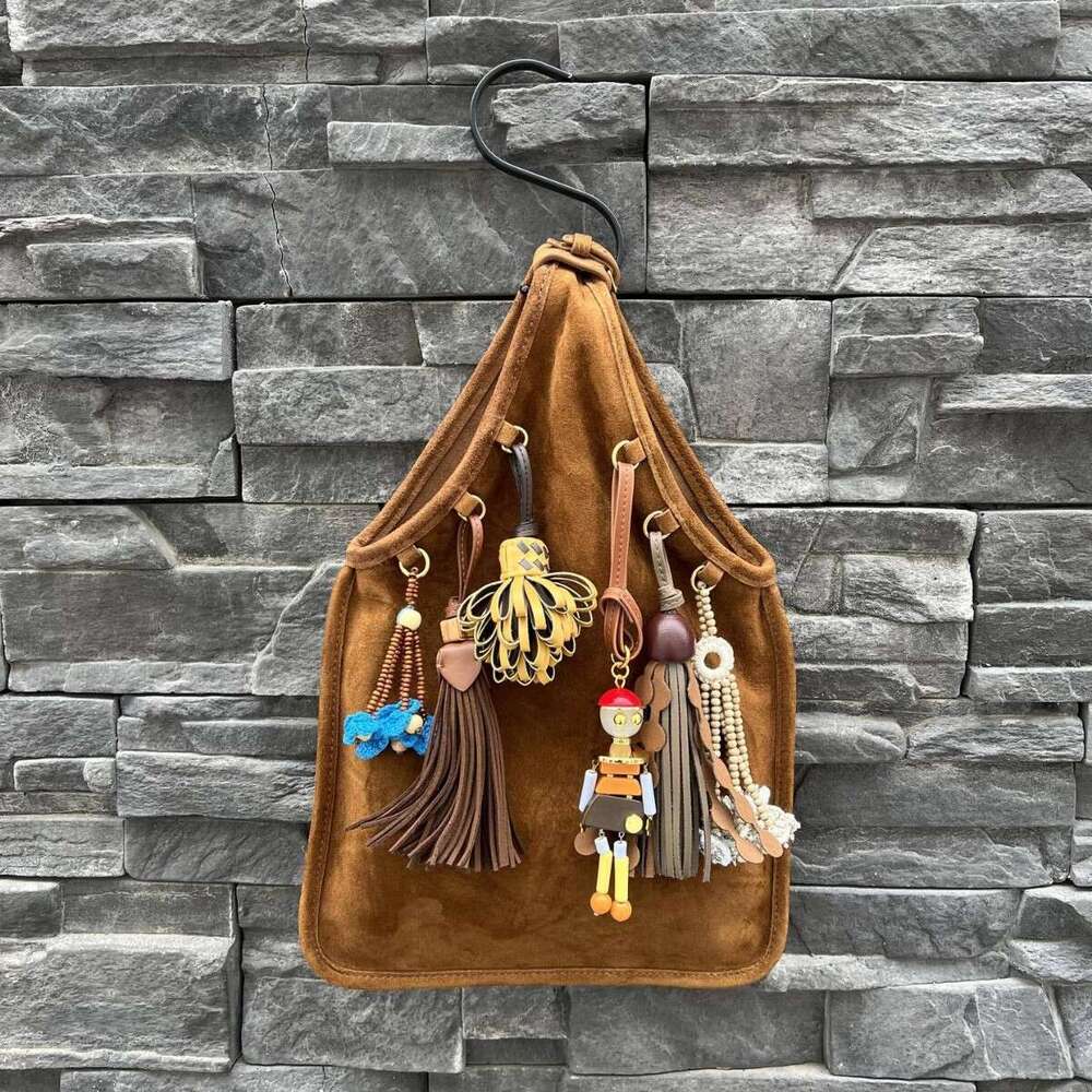 Designer bags tassel handbag leather shoulder bag doll pendant armpit bag Fashionable and high-quality