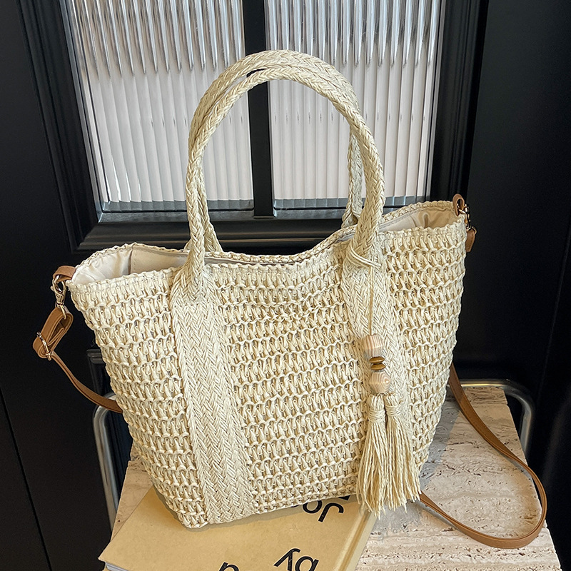 Free shipping designer New Hot Sale Simple Vacation Style Woven Tote Bag for Women Large Capacity Fashionable Mori Style Fresh Hollow Crossbody Bag