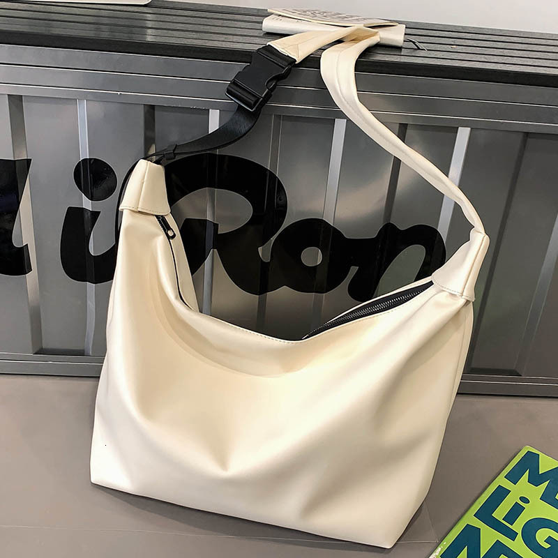 Free shipping designer Women Bag 2025 Summer New Large Capacity Tote Bag Crossbody Bag Simple Texture Commuter Shoulder Bag Crossbody Bag