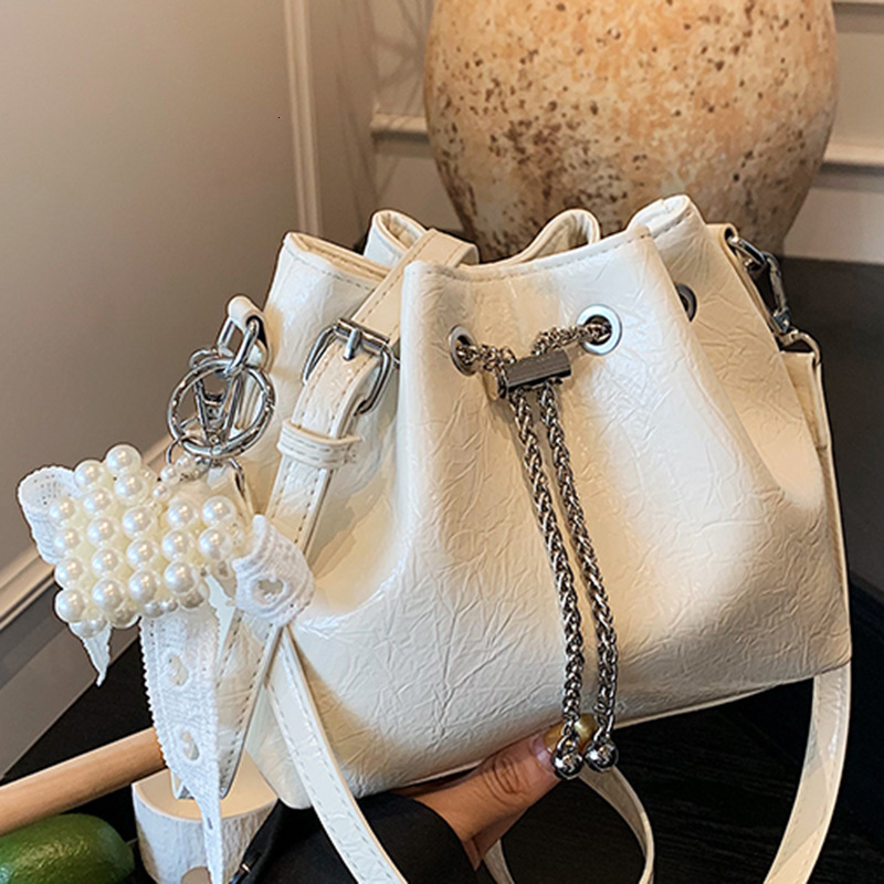 Free shipping designer Bag 2025 Summer New Loose Feel Bucket Bag Women Chain Bag Drawstring Shoulder Bag Niche Crossbody Bag Handheld Bag
