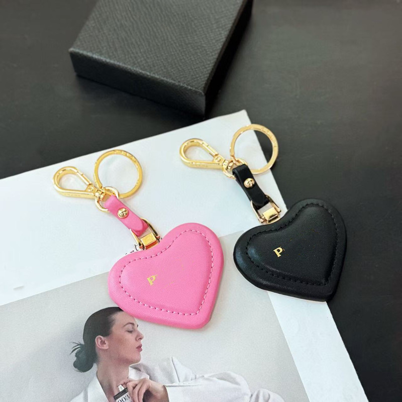 designer key chain Bag Charm heart-shaped Luxury Saffiano leather keychain for Men and Women Fashion Car keychains with Triangle Gold Plated Lanyard