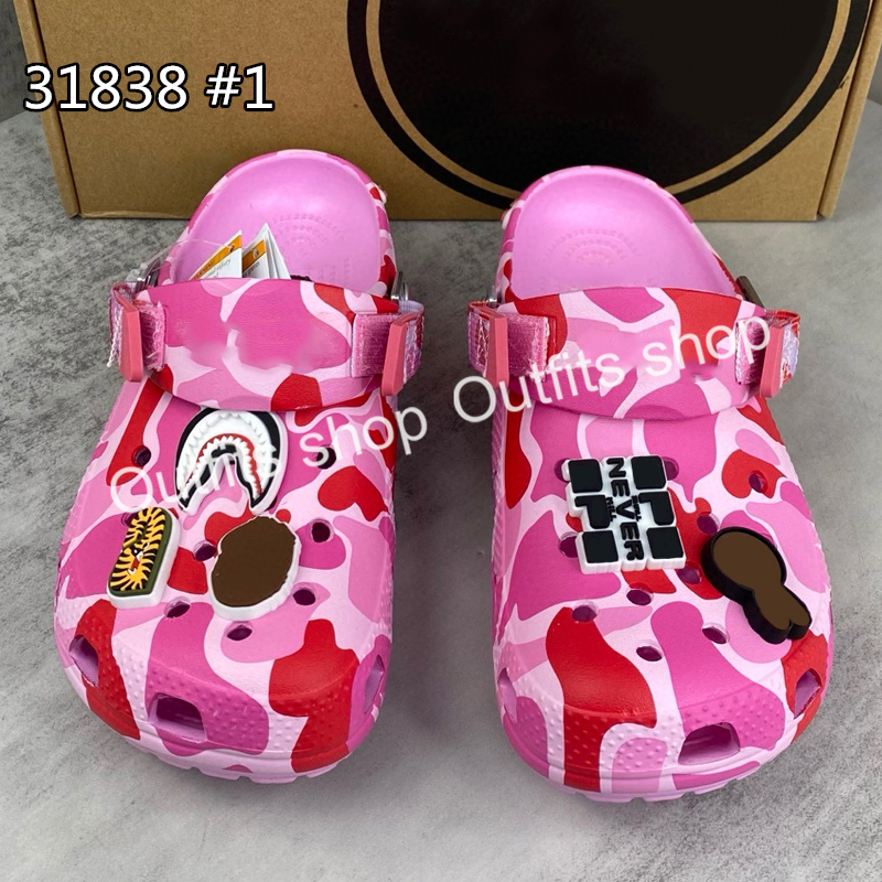 2025 hommes Femmes boucs Sliders Sandale Afficier Summer Summer plage Chaussures extérieures Chargères Slippers Size EU36-47
