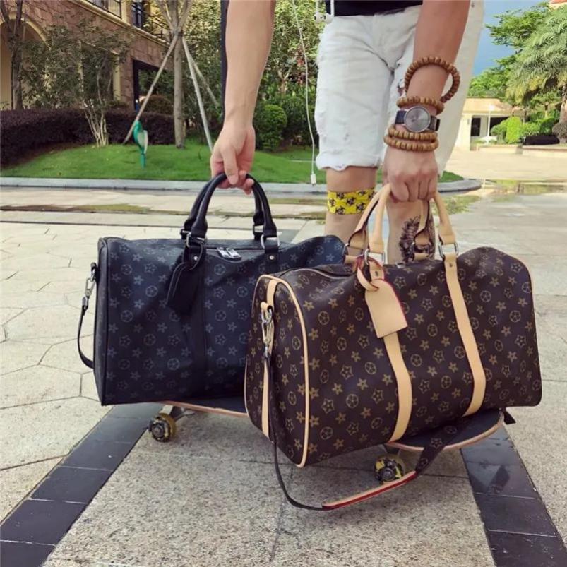 TOP Duffel Bags Outdoor Packs fashion men travel duffle bags brand designer luggage handbags With lock large capacity sport bag-image-1078797817