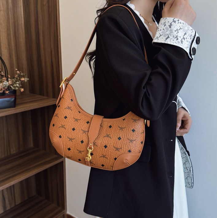 2025 Nouveaux sacs de luxe Bandbody Moon Sac Motif imprimé Croissant Polyvalent Aisselles Simple Épaule Casual Sac à bandoulière pour femmes ty
