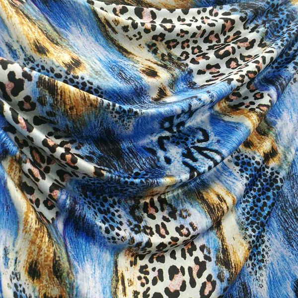 Tissu bon tissu imprimé léopard bleu/jaune 4 voies extensible tricoté coton/Spandex tissu bricolage couture robe Sexy danse du ventre Cheongsam
