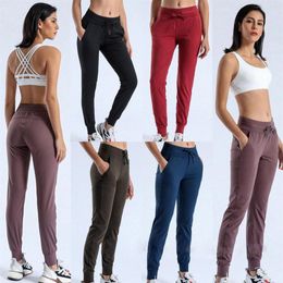 Joggers deportivos de entrenamiento de tela con sensación desnuda, pantalones recortados, cordón de cintura para mujer, pantalón deportivo para correr con dos bolsillos laterales 192H