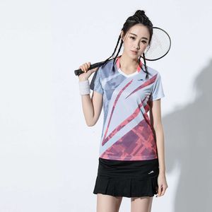 Tela nueva set de traje de bádminton coreano mesa tenis plume remos jersey jersey que absorbe la ropa de pareja transpirable
