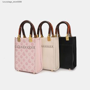 Le concepteur de marque d'usine vend 50% de réduction sur les sacs à main pour femmes en ligne de haute qualité Mini sac fourre-tout nouvelle mode de luxe pour femmes épaule diagonale musique