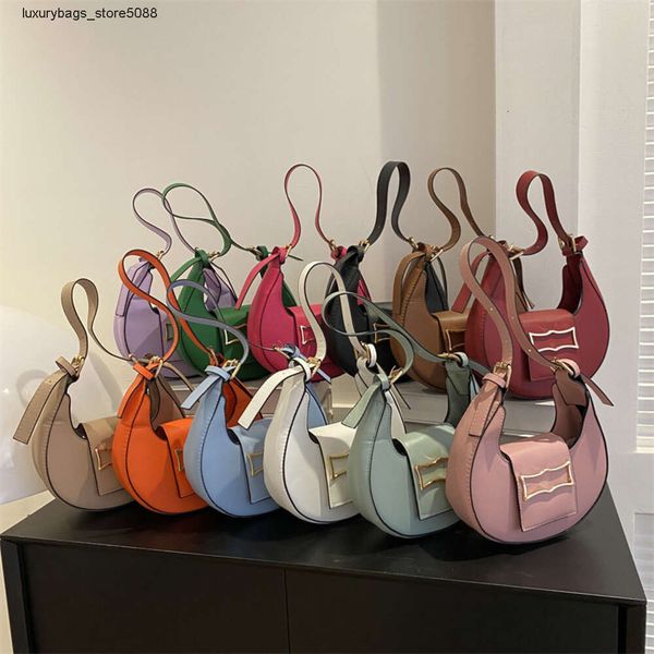 Diseñador de marca de fábrica vende 50% de descuento bolsos de mujer en línea bolso popular verano simple nuevo bolso de mano para mujer hombro de moda