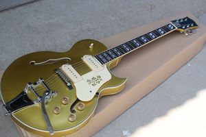 Guitarra eléctrica dorada hueca personalizada de fábrica con herrajes cromados, encuadernación en crema, sistema de trémolo, se puede personalizar