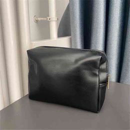 Fabriek directe verkoop echte Domtic Counter Gift zwart zacht leer make-up effen kleur handopslag en afwerking designer tas