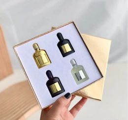 Coffrets cadeaux de parfum pour femmes et hommes, direct d'usine, 4x10ml, orchidée noire, gris, vétiver, bouteille violette dorée, parfum d'orchidée en velours, odeur longue durée, kit 4 en 1