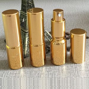 Salida de fábrica Oro Vacío Configuración de maquillaje Botella de vidrio de perfume en aerosol, Perfume de mujer Parfum, Botella de perfume de vidrio de perfumes de rociador de niebla al por mayor