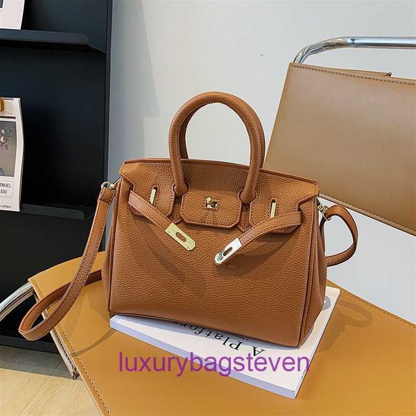 Factory outlet al por mayor hremms birkks bolsas para la venta nueva cerradura hebilla de mano bolso de la mano tendencia de moda luz de lujo versátil con logotipo real