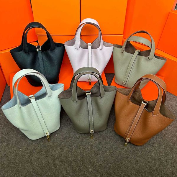 Outlet de fábrica Bolsas de asas de fiesta al por mayor para la venta Cesta de verduras sensorial avanzada Bolsa para mujer Cubo de cuero genuino 2024 Nueva capa superior de cuero de vaca Popu