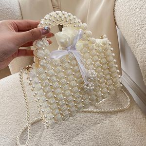 Sac à bandoulière pour femmes en usine Small Design Perled Sac à main tissé Western Style Hollowed Out Sac Small Fresh and Sweet Pearl Handbags 10512 # #