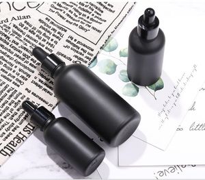 Prix ​​d'usine Black Matte Glass Dropper bouteilles 30 ml 50 ml 100 ml Viaux d'huile essentielle vides Conteneurs cosmétiques livraison gratuite