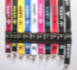 Precio de fábrica Correas para teléfonos celulares Charms 10pcs / Universal Brand sport logo Lanyard para MP3 / 4 llavero cordones Insignia al por mayor para mujeres hombres # 61