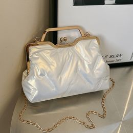 Factory verkoop schoudertas 4 kleur trend reliëfproces knijpen retro handtassen elegante solide kleur lichtgewicht fashion backpack winter populaire dames handtas