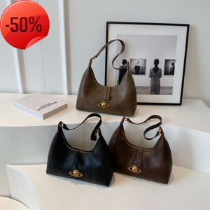 Tiendas de fábrica, bolso para las axilas para mujer, otoño/invierno 2024, nuevo bolso de hombro Wandering Planet