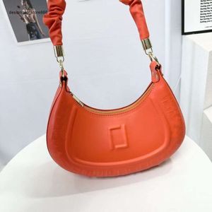 Sacs pour femmes de mode en gros d'usine Version coréenne de petit sac pour femmes au printemps nouveau en forme de croissant coquille Prsed épaule unique couleur unie polyvalent sous les bras