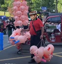 Jouets d'animaux gonflables pour ragoût de tête de porc, vente en gros d'usine, poussant le produit cadeau, endroit pittoresque, parc de marché nocturne