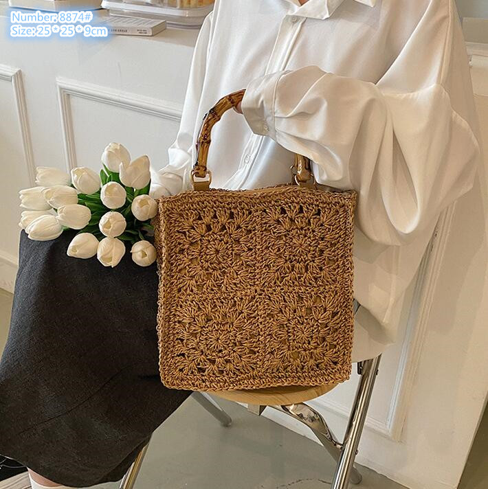 Factory wholesale ladies shoulder bags 2 colors sweet hollow crocheted handbag summer vacation beach travel woven beach bag personalized straw handbags 8874#