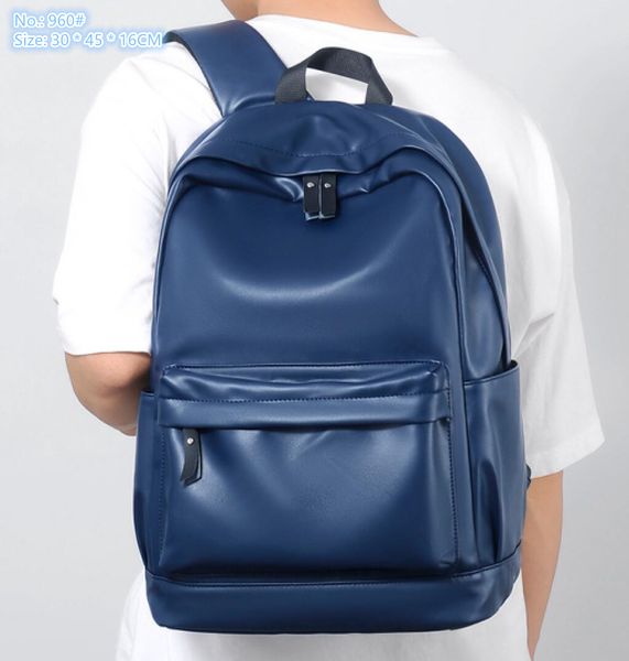 Venta al por mayor de fábrica, bolsos de hombro para hombres, 2 colores, estilo universitario, color sólido, mochila de cuero, atmósfera simple, bolso vertical para hombre, bolso de computadora Joker