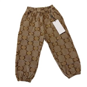 Otoño / Invierno nuevos pantalones de diseño para niños Pantalones elásticos con estampado geométrico de moda para niños Pantalones casuales para acampar en la calle pantalones de moda tamaño 90-150 cm d024