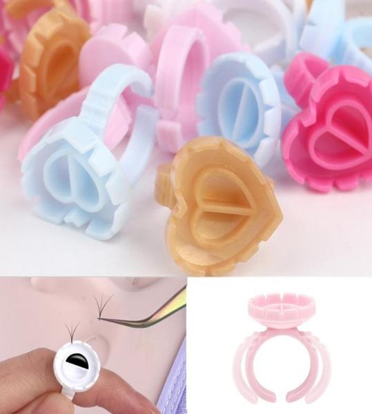 Las pestañas postizas vienen 50100 unids desechables en forma de V pegamento de pestañas anillos de copa fácil de hacer ventiladores de volumen Nail Art Adhesibve Holder M4467059