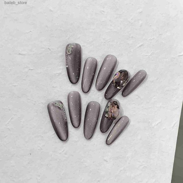 Faux ongles 10pcs de long Stiletto Nails artificiels avec designs Eyes Cat Purple Gem Stone Press Press sur des ongles en acrylique Amond Faux Nails Y240419